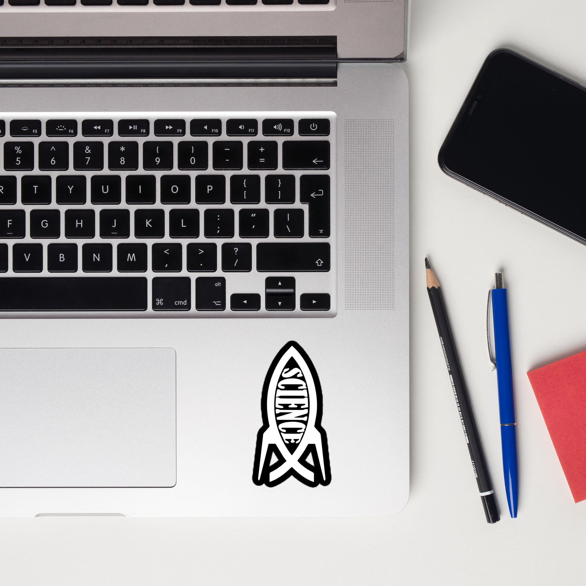 Science Rocketship Sticker on a laptop